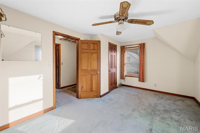 135 Oak Tree Dr, Webster Groves, MO 63119 - unfurnished bedroom with carpet, a ceiling fan, and a closet