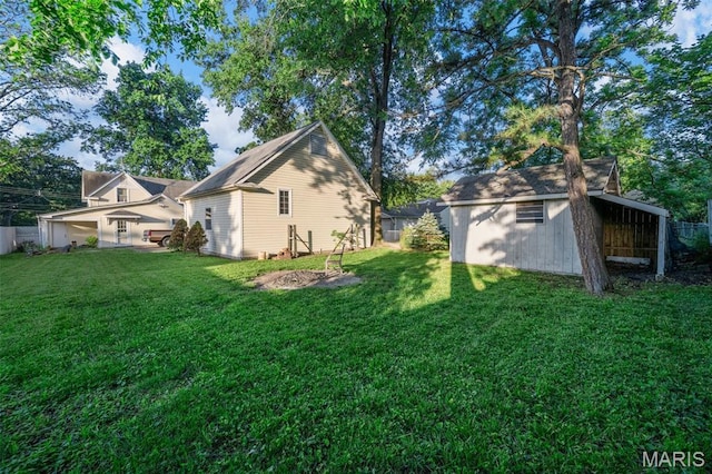 135 Oak Tree Dr, Webster Groves, MO 63119 - view of side of home featuring an outbuilding
