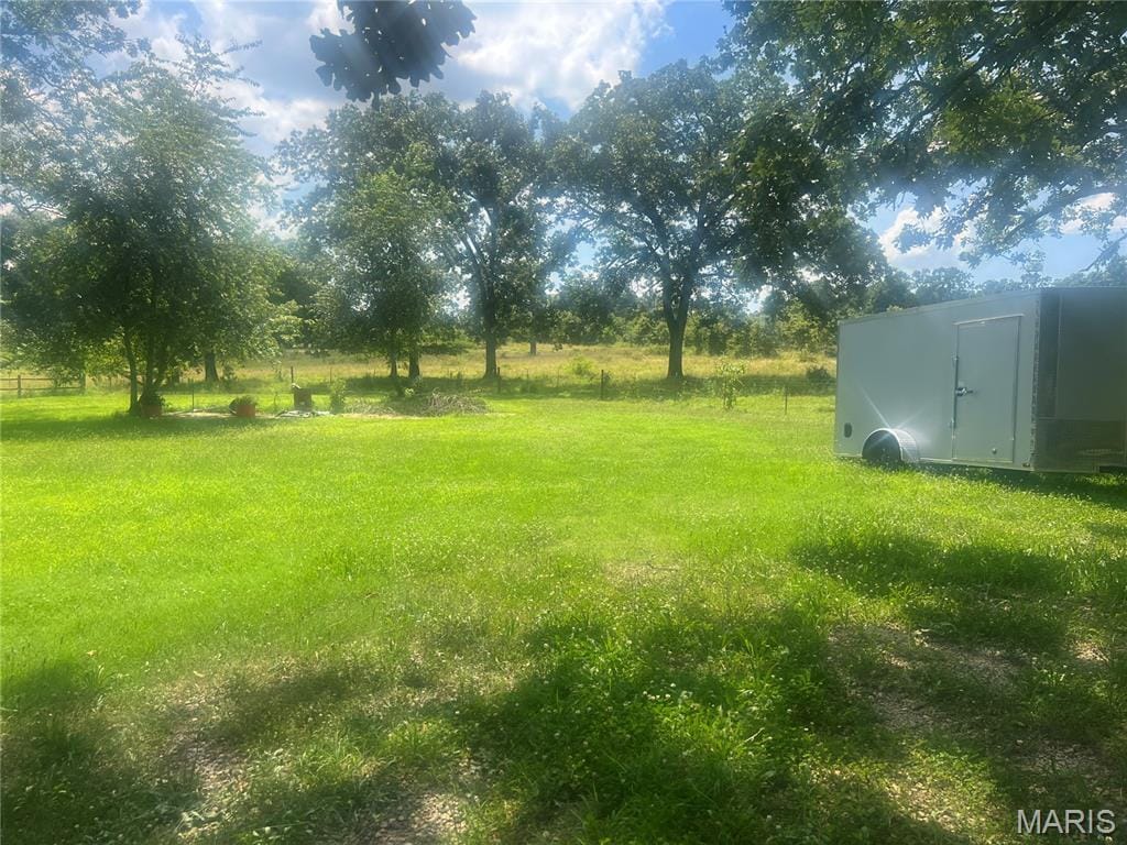 31955 US Highway 60, Ellsinore, MO 63937 - view of green lawn featuring a storage shed
