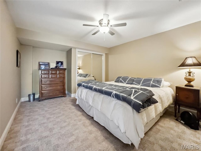 1171 Thunder Mountain Rd, Camdenton, MO 65020 - bedroom featuring a closet, light carpet, and ceiling fan
