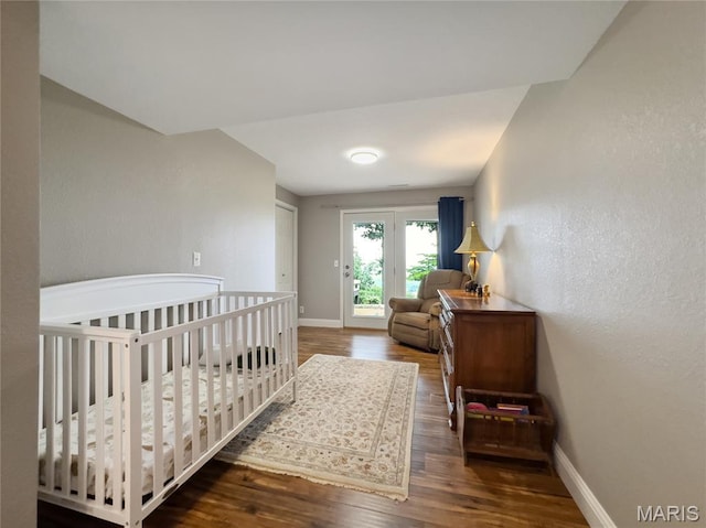 1171 Thunder Mountain Rd, Camdenton, MO 65020 - bedroom featuring wood finished floors and a textured wall