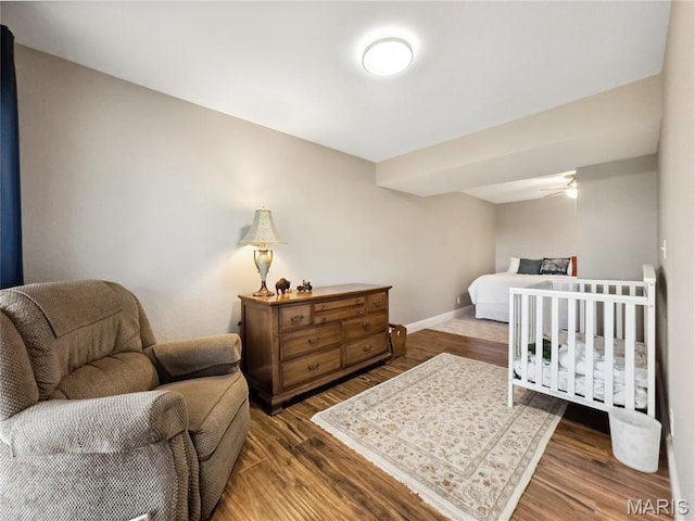 1171 Thunder Mountain Rd, Camdenton, MO 65020 - bedroom featuring wood finished floors and baseboards