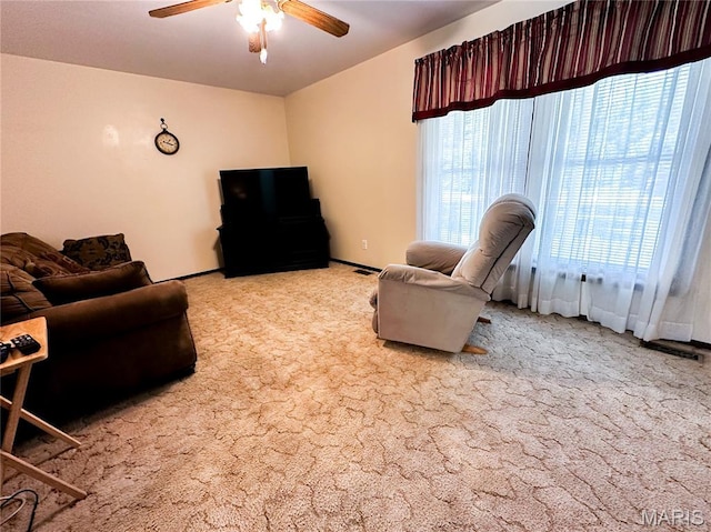 410 N Cleveland St, Fillmore, IL 62032 - living room with a ceiling fan and light colored carpet