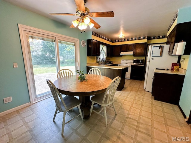 410 N Cleveland St, Fillmore, IL 62032 - dining room featuring light floors, plenty of natural light, and a ceiling fan