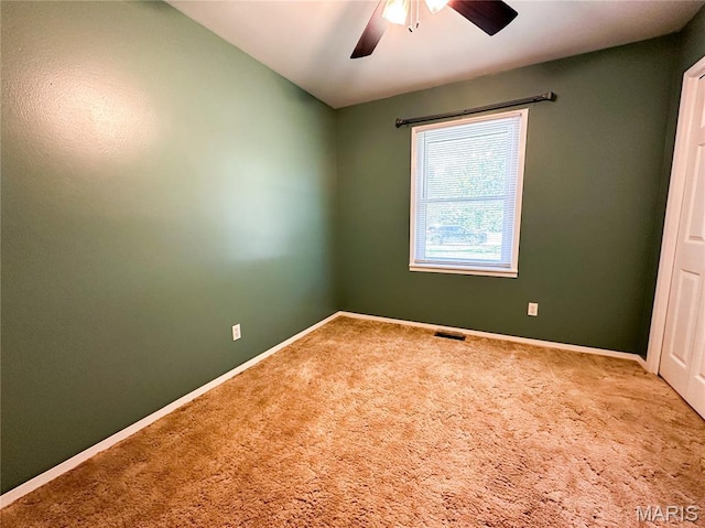410 N Cleveland St, Fillmore, IL 62032 - carpeted spare room with ceiling fan and baseboards