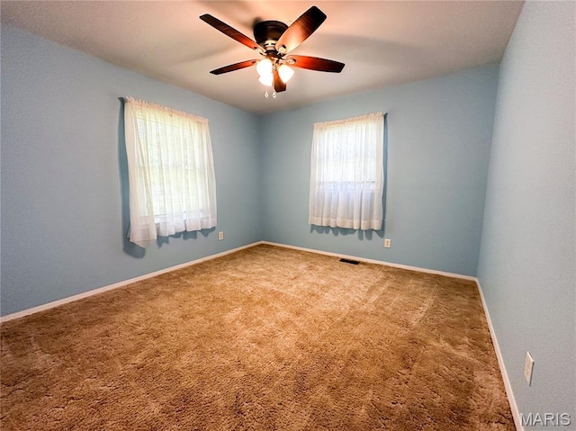 410 N Cleveland St, Fillmore, IL 62032 - carpeted empty room featuring ceiling fan and baseboards