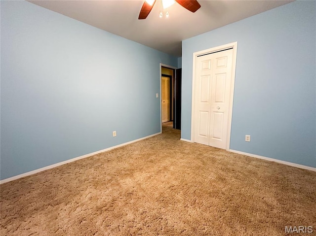 410 N Cleveland St, Fillmore, IL 62032 - unfurnished bedroom featuring carpet, a closet, and ceiling fan