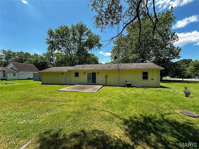 410 N Cleveland St, Fillmore, IL 62032 - back of house with a patio area and a yard