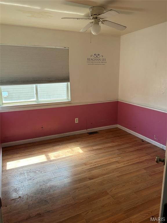12922 High Crest St, Black Jack, MO 63033 - unfurnished room featuring wood finished floors and a ceiling fan