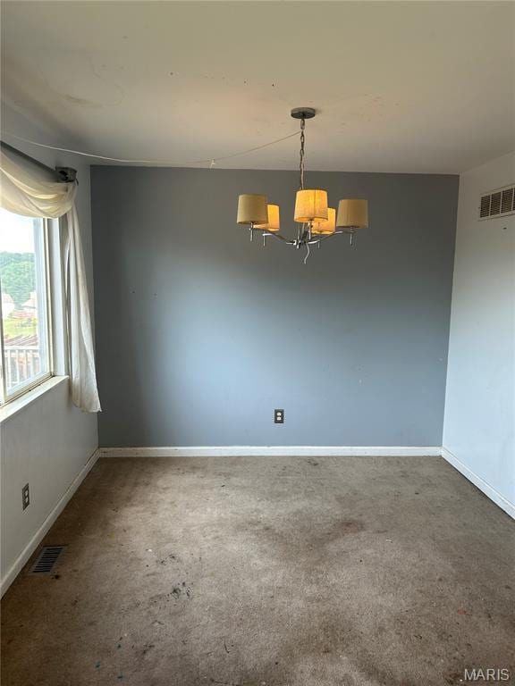 12922 High Crest St, Black Jack, MO 63033 - carpeted spare room with a chandelier and baseboards