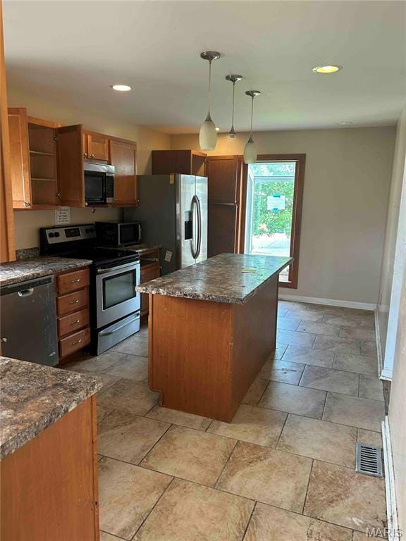 12922 High Crest St, Black Jack, MO 63033 - kitchen featuring appliances with stainless steel finishes, a center island, open shelves, hanging light fixtures, and brown cabinets
