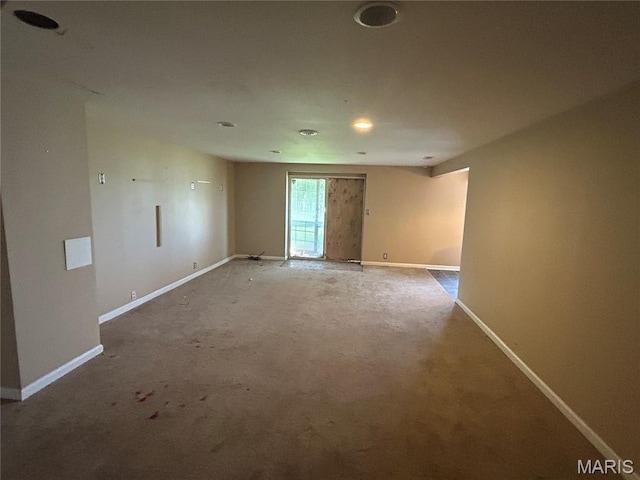 12922 High Crest St, Black Jack, MO 63033 - carpeted empty room with baseboards