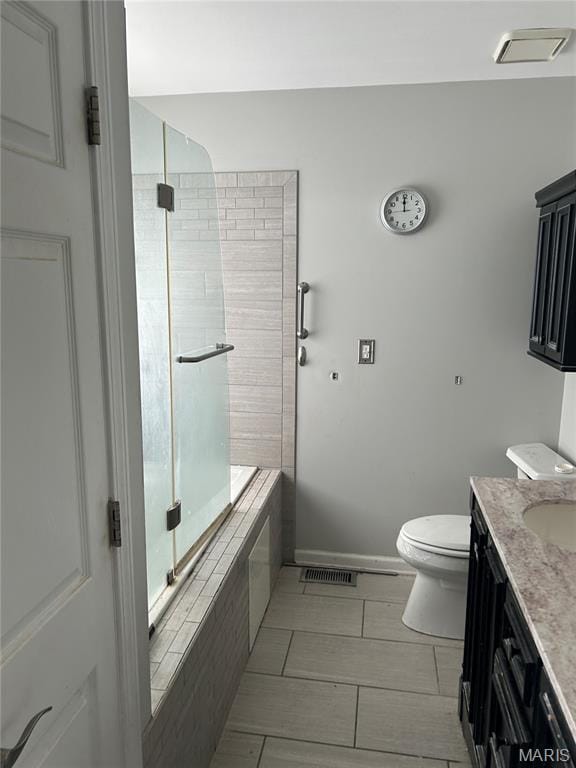 12922 High Crest St, Black Jack, MO 63033 - full bathroom featuring vanity, tile patterned flooring, and tiled shower / bath