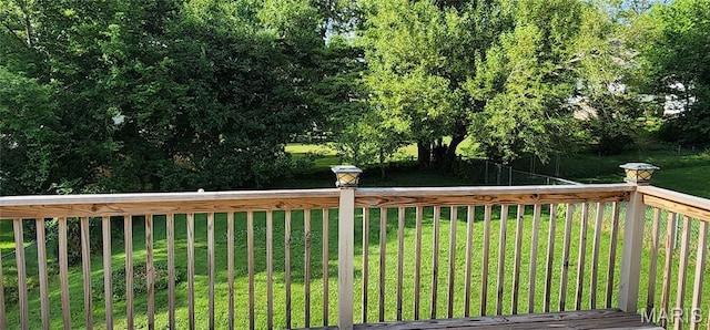 934 Raines Ave, Jackson, MO 63755 - wooden deck featuring a lawn