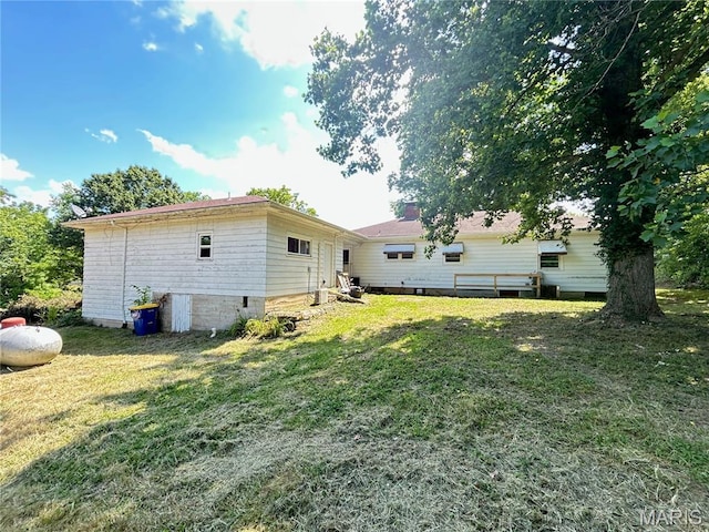 1203 N Main St, Salem, MO 65560 - rear view of house with a lawn and a chimney