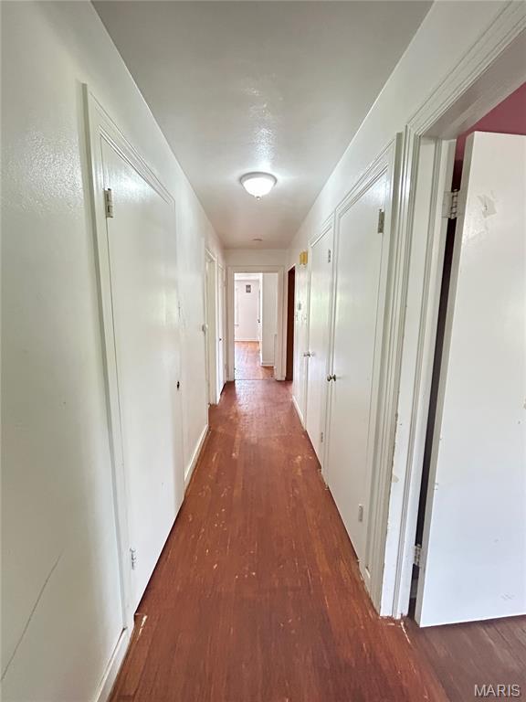 1203 N Main St, Salem, MO 65560 - hall with wood finished floors and baseboards