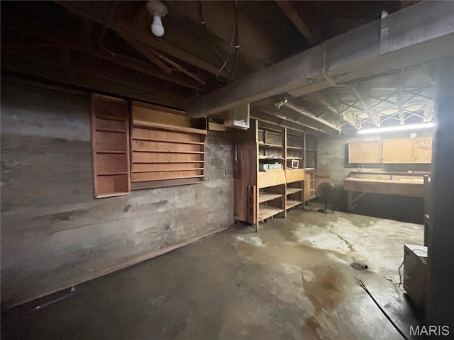 1203 N Main St, Salem, MO 65560 - unfinished below grade area featuring a workshop area