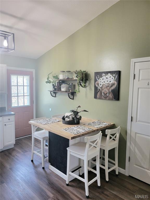 346 Cartpath Ln, Saint Clair, MO 63077 - dining room with dark wood-style floors and baseboards