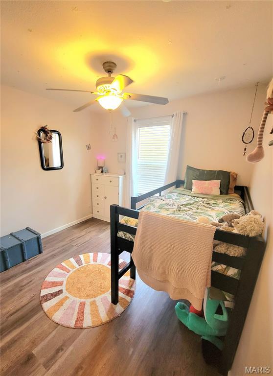 346 Cartpath Ln, Saint Clair, MO 63077 - bedroom with wood finished floors and ceiling fan