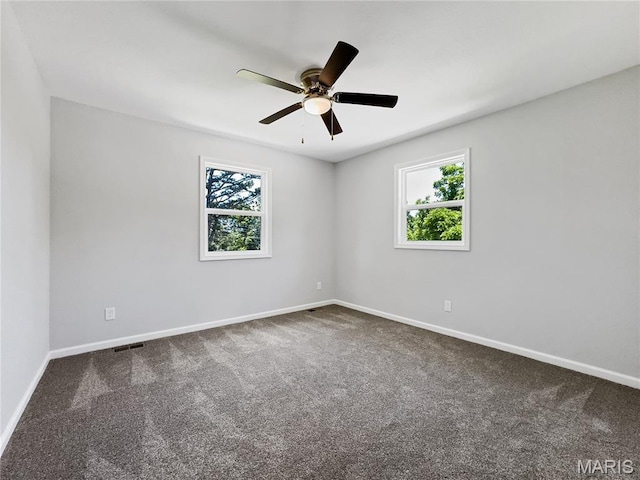 326 State Highway W Rd, Macks Creek, MO 65786 - unfurnished room featuring plenty of natural light, carpet, and ceiling fan