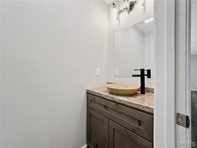 326 State Highway W Rd, Macks Creek, MO 65786 - bathroom with vanity and baseboards