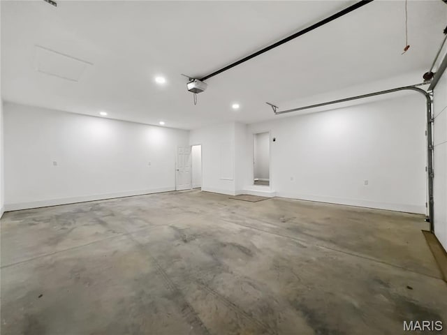 326 State Highway W Rd, Macks Creek, MO 65786 - garage featuring a garage door opener and recessed lighting