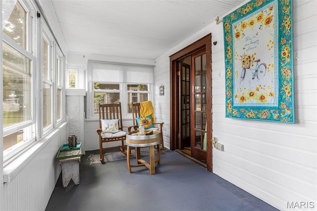 110 Brand Pl, Bonne Terre, MO 63628 - sunroom featuring finished concrete flooring and wood walls
