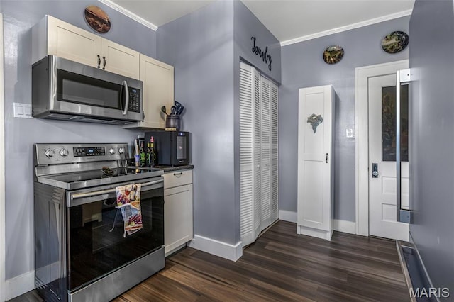 110 Brand Pl, Bonne Terre, MO 63628 - kitchen featuring appliances with stainless steel finishes, dark wood-type flooring, crown molding, and white cabinets