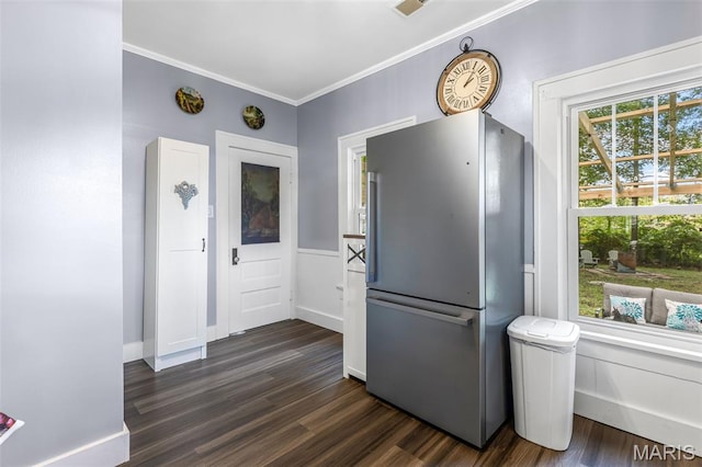 110 Brand Pl, Bonne Terre, MO 63628 - kitchen featuring freestanding refrigerator, dark wood-style flooring, and ornamental molding