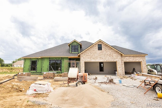 505 Master Ct, Shiloh, IL 62221 - view of front of house with brick siding, roof with shingles, a garage, and driveway