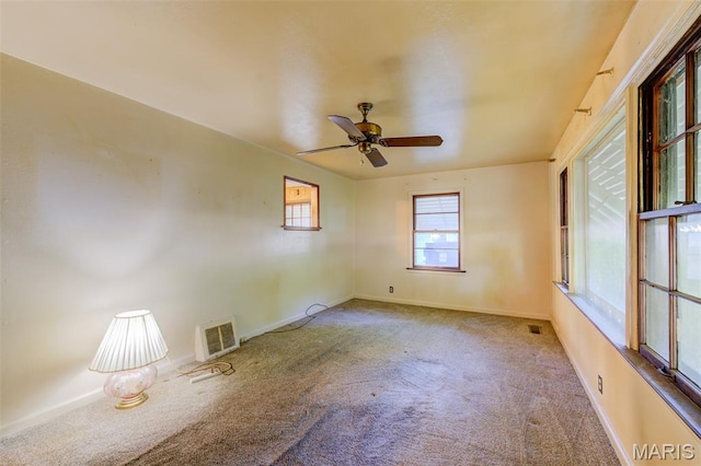 8232 Davenport Dr, Berkeley, MO 63134 - carpeted empty room featuring a ceiling fan and baseboards
