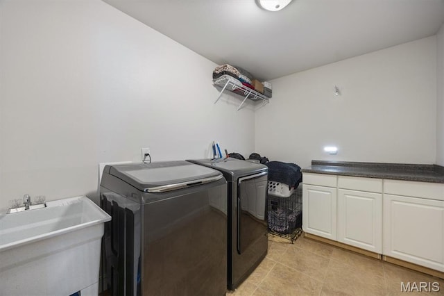 437 Marbleton Cir, Ofallon, IL 62269 - laundry area with cabinet space, washing machine and clothes dryer, and light tile patterned floors