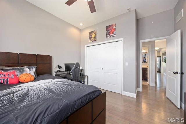 437 Marbleton Cir, Ofallon, IL 62269 - bedroom featuring wood finished floors, a towering ceiling, ceiling fan, a closet, and recessed lighting