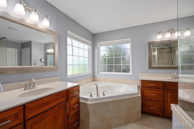437 Marbleton Cir, Ofallon, IL 62269 - bathroom with two vanities, tile patterned flooring, a bath, and a tile shower