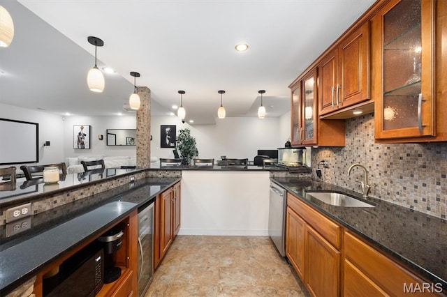 437 Marbleton Cir, Ofallon, IL 62269 - kitchen featuring brown cabinets, tasteful backsplash, dark stone countertops, and hanging light fixtures