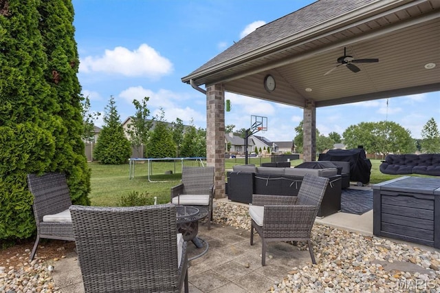 437 Marbleton Cir, Ofallon, IL 62269 - view of patio with an outdoor hangout area, a trampoline, a ceiling fan, and grilling area
