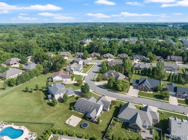 437 Marbleton Cir, Ofallon, IL 62269 - aerial perspective of suburban area with a heavily wooded area and a pool