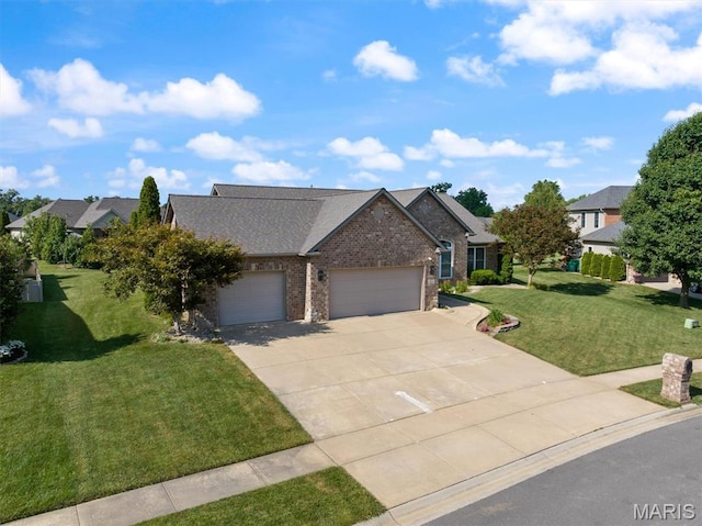 437 Marbleton Cir, Ofallon, IL 62269 - view of front of property with an attached garage, concrete driveway, a front lawn, brick siding, and a residential view