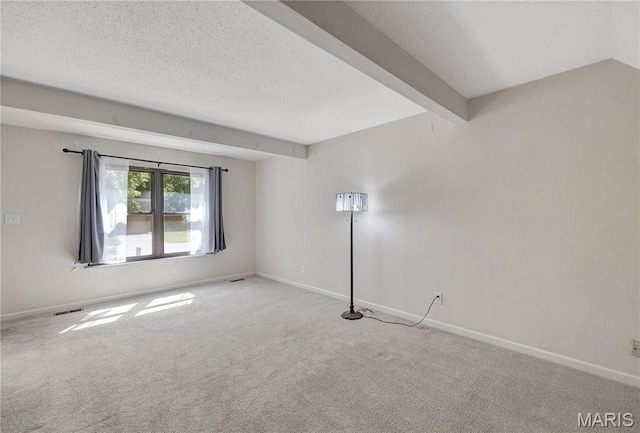 2417 Charente Dr, Maryland Heights, MO 63043 - carpeted empty room with baseboards and a textured ceiling