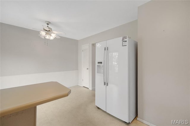 2417 Charente Dr, Maryland Heights, MO 63043 - unfurnished dining area featuring a ceiling fan and baseboards