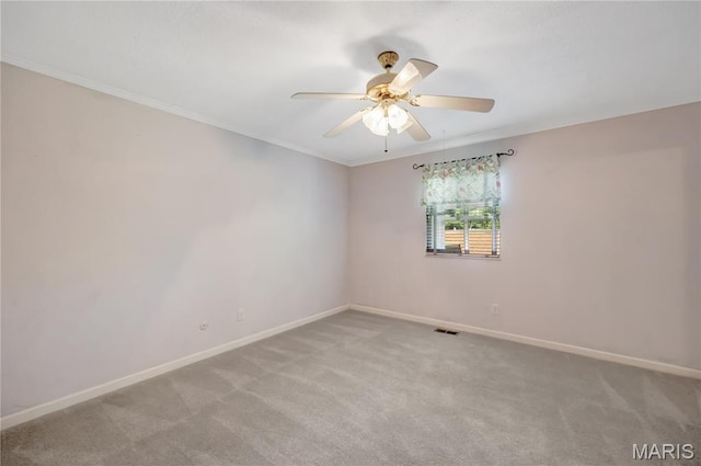 2417 Charente Dr, Maryland Heights, MO 63043 - empty room with a ceiling fan, light colored carpet, and ornamental molding