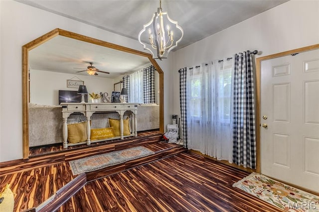 511 N Acre Dr, Richland, MO 65556 - foyer entrance featuring wood finished floors, a chandelier, and ceiling fan