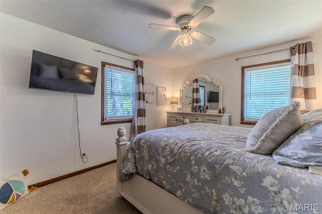 511 N Acre Dr, Richland, MO 65556 - bedroom featuring carpet and ceiling fan