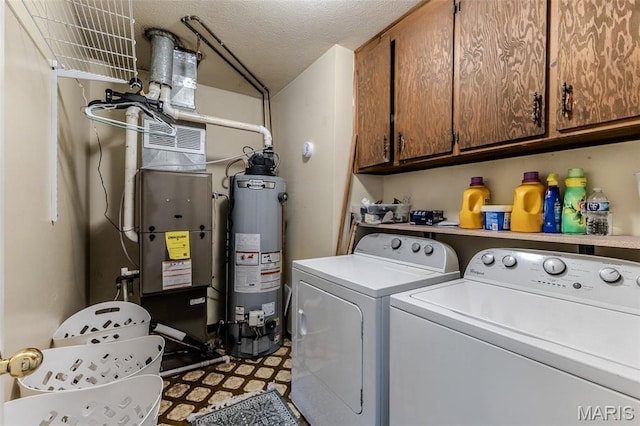 511 N Acre Dr, Richland, MO 65556 - laundry room featuring gas water heater, cabinet space, washer and dryer, tile patterned floors, and heating unit