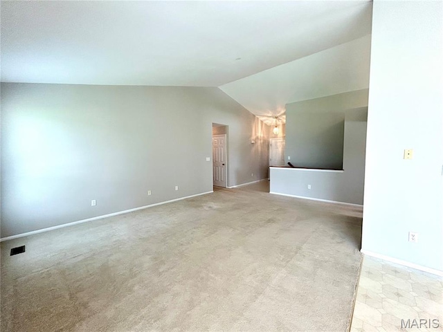 2401 Mountain Range Ct, Pacific, MO 63069 - empty room featuring lofted ceiling and light colored carpet