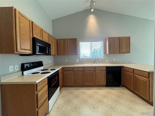 2401 Mountain Range Ct, Pacific, MO 63069 - kitchen featuring black appliances, light countertops, brown cabinetry, and high vaulted ceiling