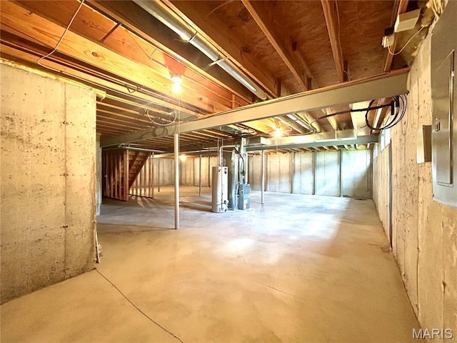2401 Mountain Range Ct, Pacific, MO 63069 - unfinished basement featuring gas water heater