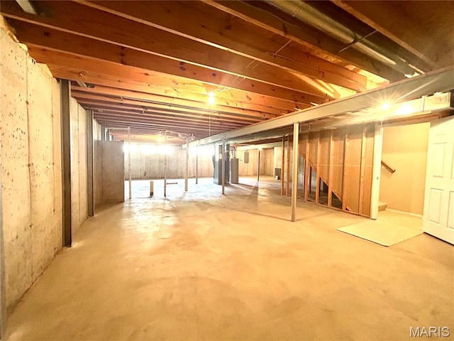 2401 Mountain Range Ct, Pacific, MO 63069 - unfinished basement with stairs