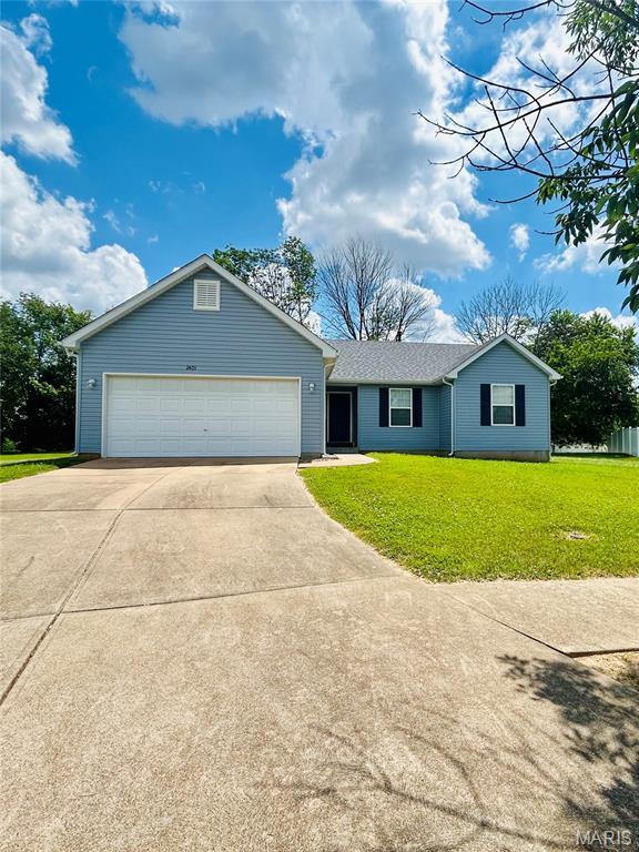 2401 Mountain Range Ct, Pacific, MO 63069 - ranch-style house with concrete driveway, a front lawn, and an attached garage