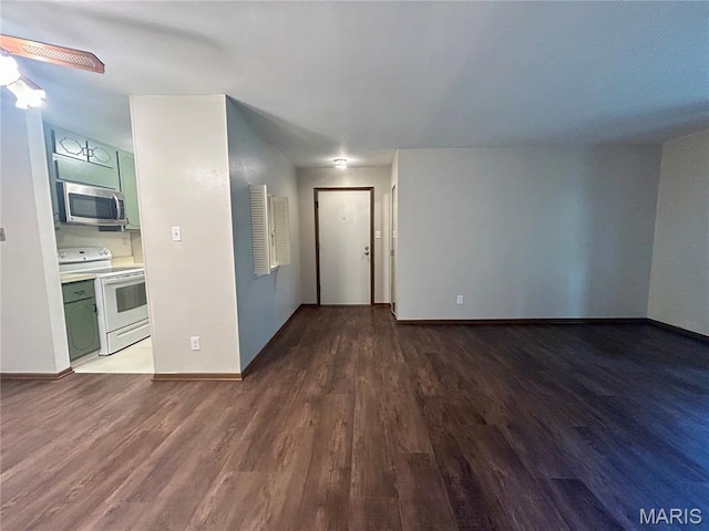 4278 Kay Ln Unit 2, Saint Louis, MO 63123 - unfurnished living room featuring dark wood-style floors and ceiling fan